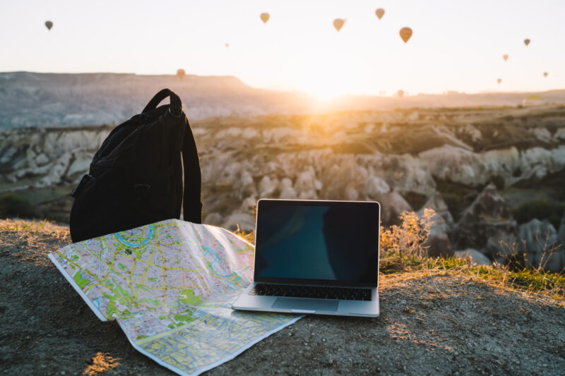 backpack-map-and-computer-overlook-cappadocia-la-2026-03-24-22-44-34-utc